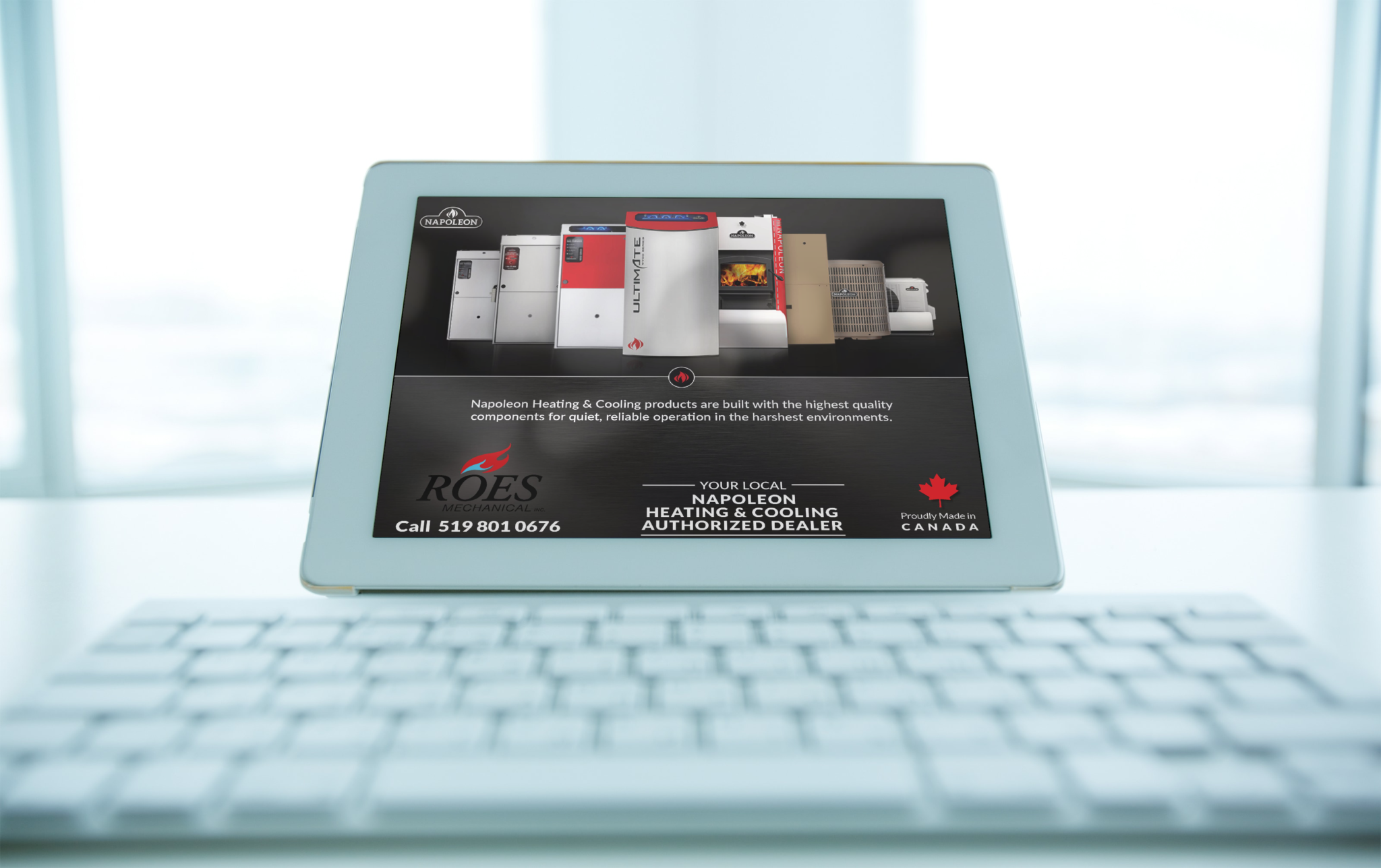 8 furnaces lined up showing what is sold by roes Mechanical with the Napoleon furnace in the front. It also has the contact information and name on the display of an iPad with a Bluetooth keyboard in front